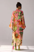 Back view of Alani a pink ombre Dress with double georgette maxi and flare sleeves, and silhouette, perfect for day-to-evening styling.