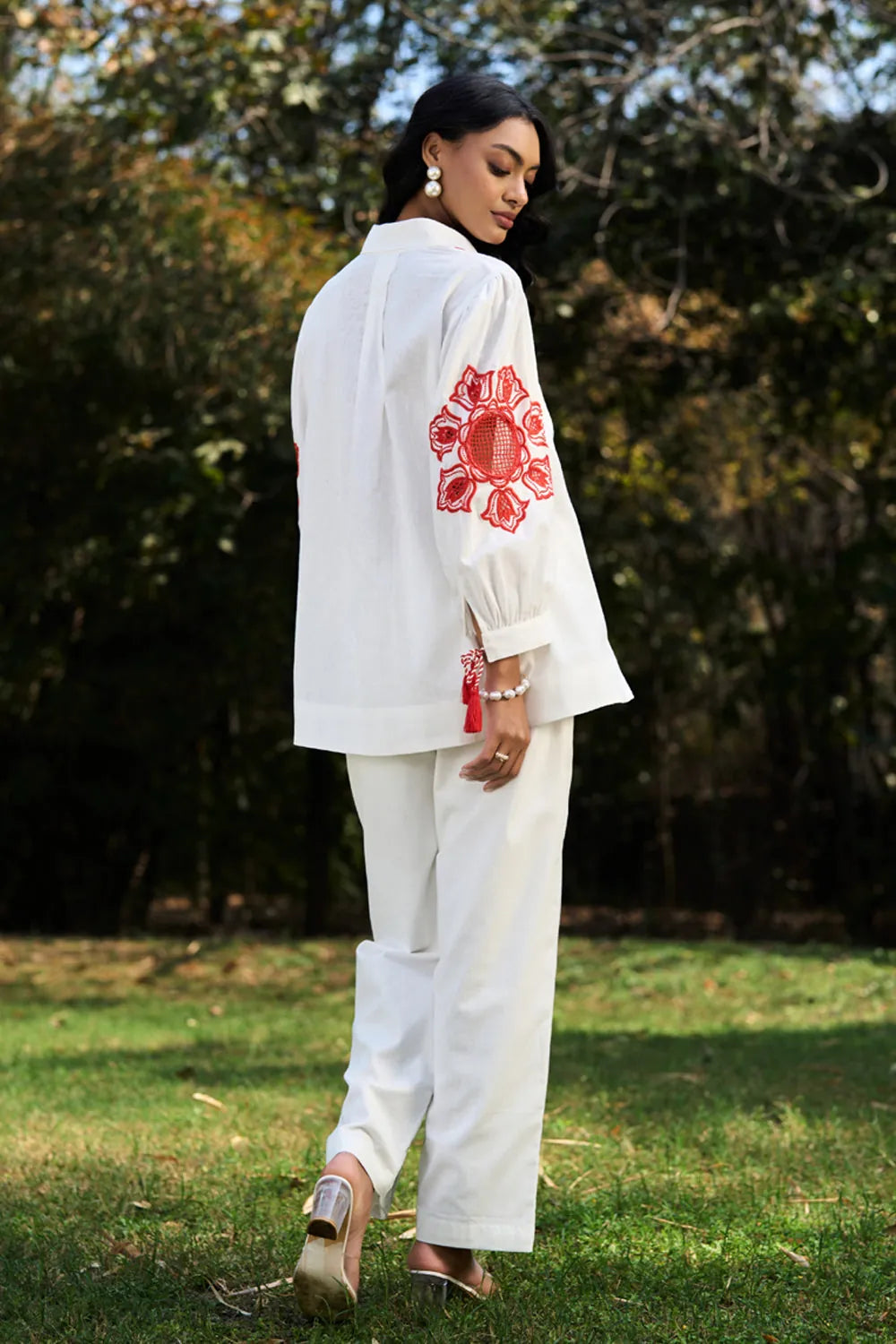 Back view of Alira Embroidered Shirt in ivory with breathable cotton features intricate embroidery perfect for day to night outings, vacations.