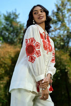 Closeup look of Alira Embroidered Shirt with Pants Set in ivory with breathable cotton features intricate embroidery perfect for day to night outings, vacations.