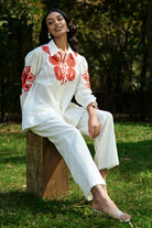 Alira Embroidered Shirt in ivory with breathable cotton features intricate embroidery perfect for day to night outings, vacations.