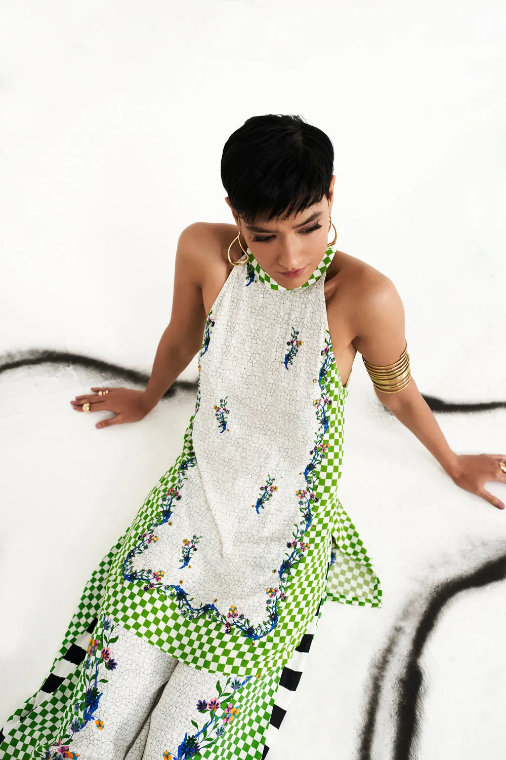 Anvesha multicolour printed co-ord set showing the sleeveless long top and matching wide-leg pants with colourful floral motifs and contrasting printed borders