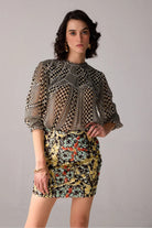 Aria floral mini skirt featuring a multicolour botanical print, fitted mini silhouette and intricate embellishment details