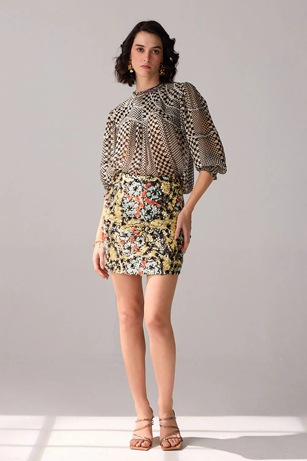 Aria multicolour floral mini skirt with a fitted silhouette, vibrant botanical print and detailed embellished finish